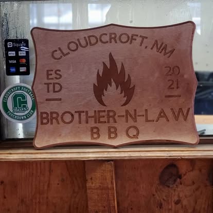 Brother-N-Law BBQ carved wooden sign with flame logo, established 2021, Cloudcroft NM