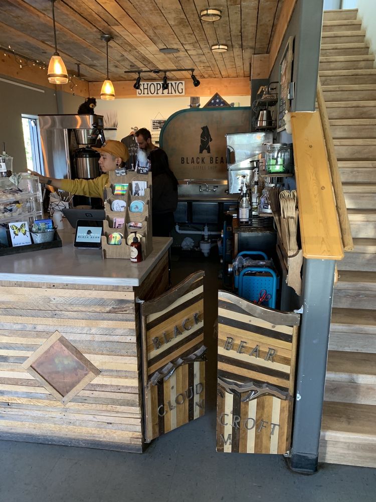 Counter and stairs to upstairs shopping area at Black Bear Coffee