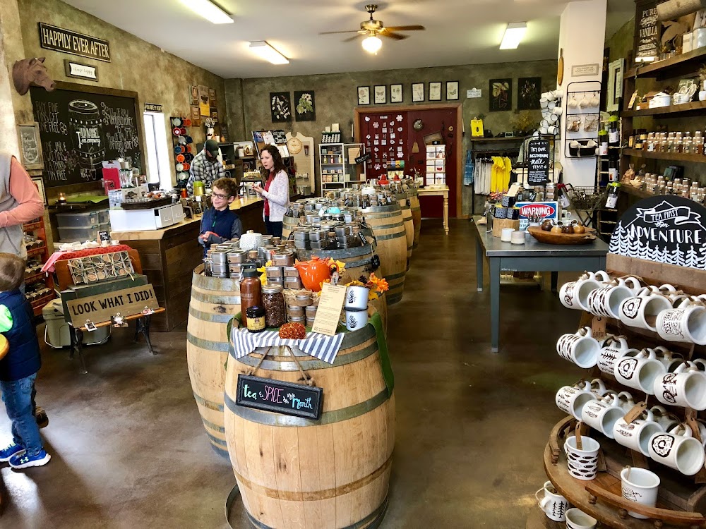 Old Barrel Tea Company interior — barrels, mugs, and product displays