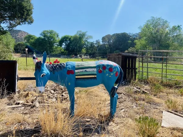 Painted blue burro sculpture on Burro Avenue, Cloudcroft
