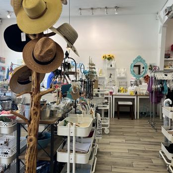 Interior of CoCo Blu showing hats, jewelry, and accessories displays