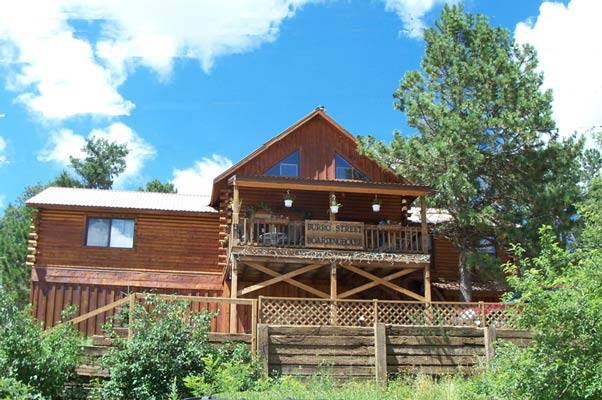 Burro Street Boarding House exterior from trail