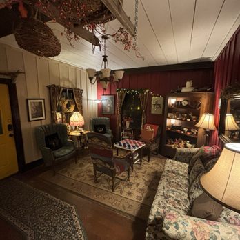 Interior parlor with vintage furnishings at The Crofting Bed and Breakfast