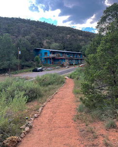 Cloudcroft Hostel exterior from trail