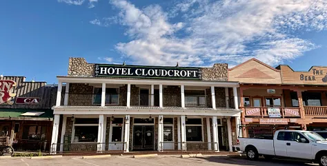 The Hotel Cloudcroft facade and porch on Burro Avenue