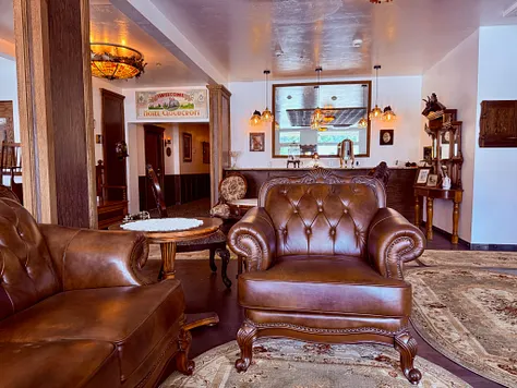 Leather chesterfield seating in the Hotel Cloudcroft lobby