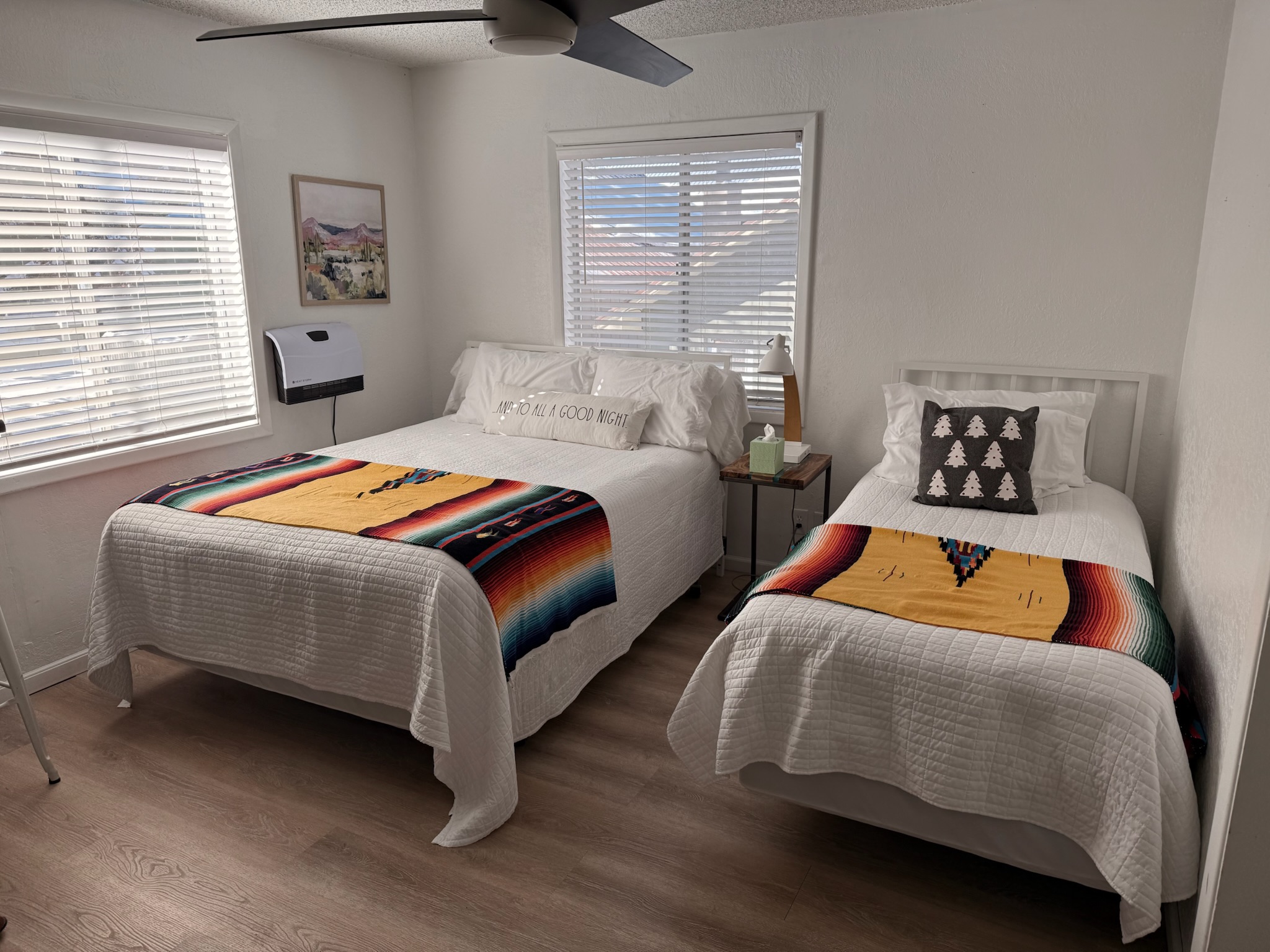 Queen and twin bed room with Southwest blankets at The Summit Inn