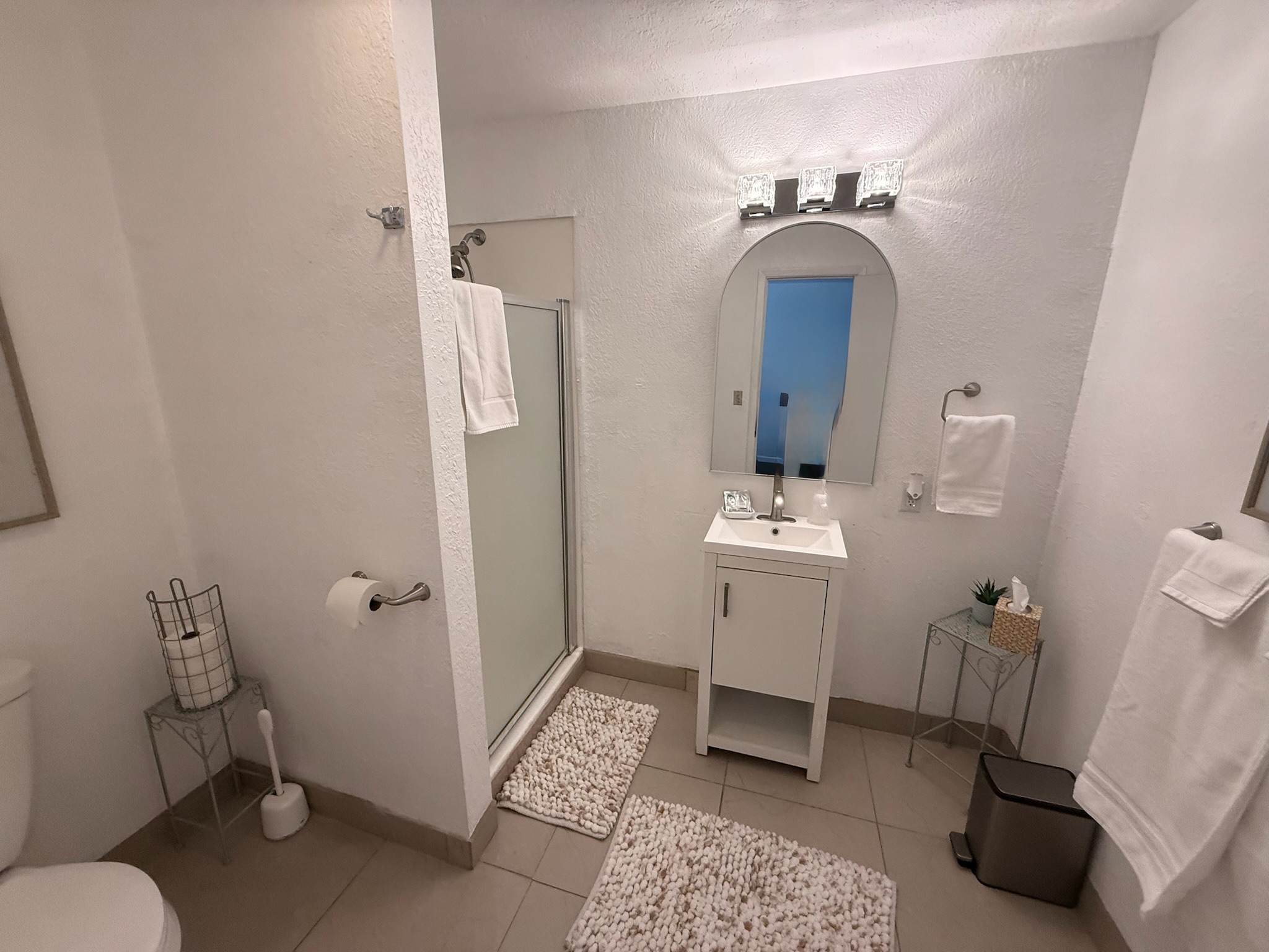 Clean renovated bathroom with walk-in shower at The Summit Inn